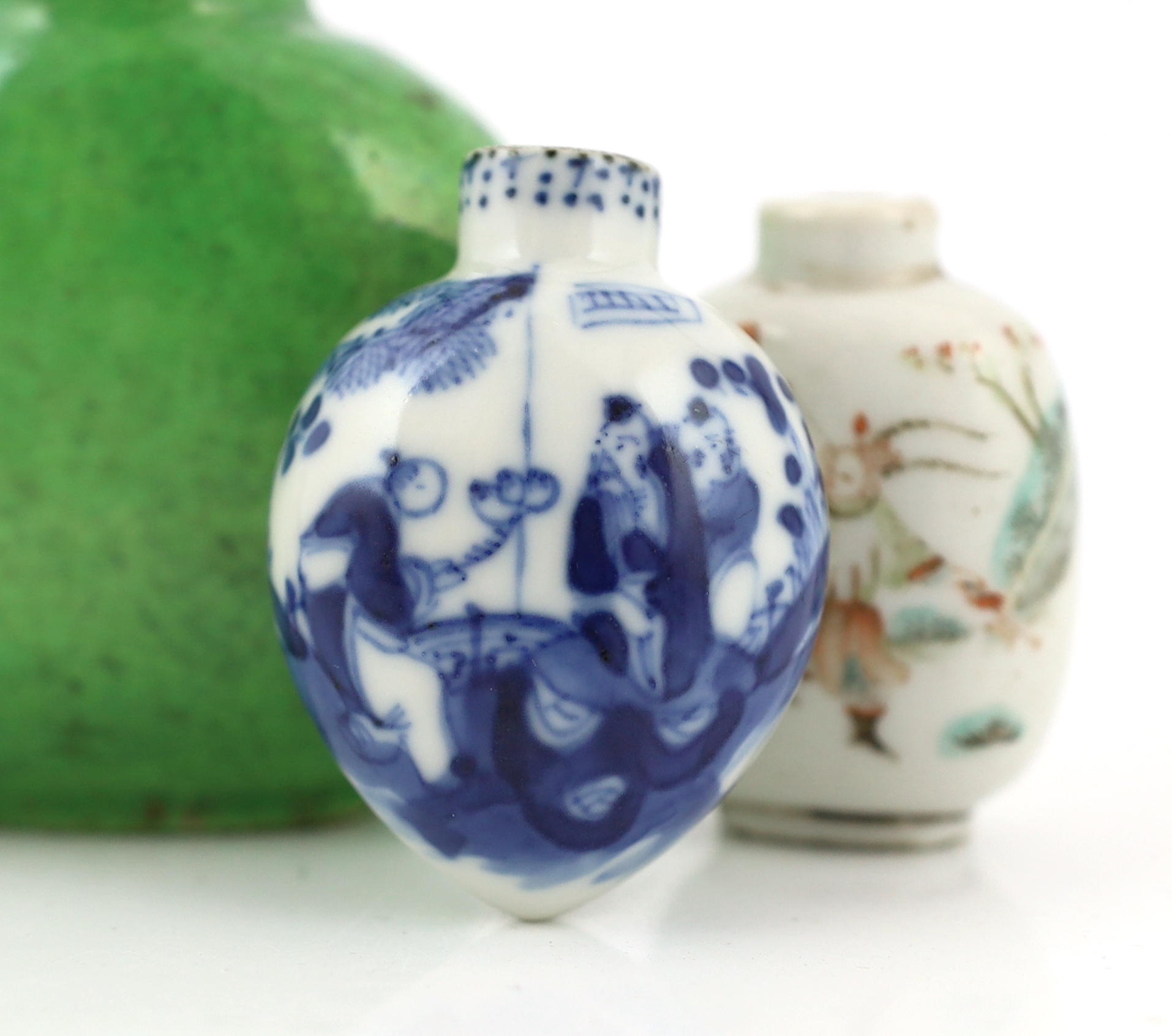 A large Chinese green crackle glazed snuff bottle, Daoguang mark and period, and three other 19th century porcelain snuff bottles